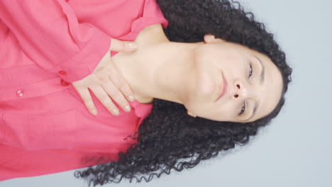 Vertical-video-of-Sick-young-woman-coughing.
